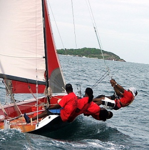 grenada sailing festival guys racing in sailboat